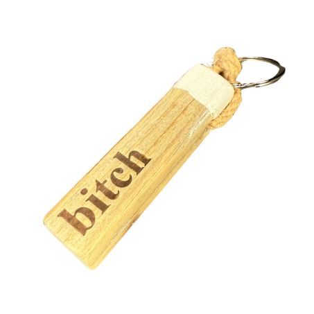 Freche houten sleutelhanger "Bitch" van duurzaam dukdalf hout